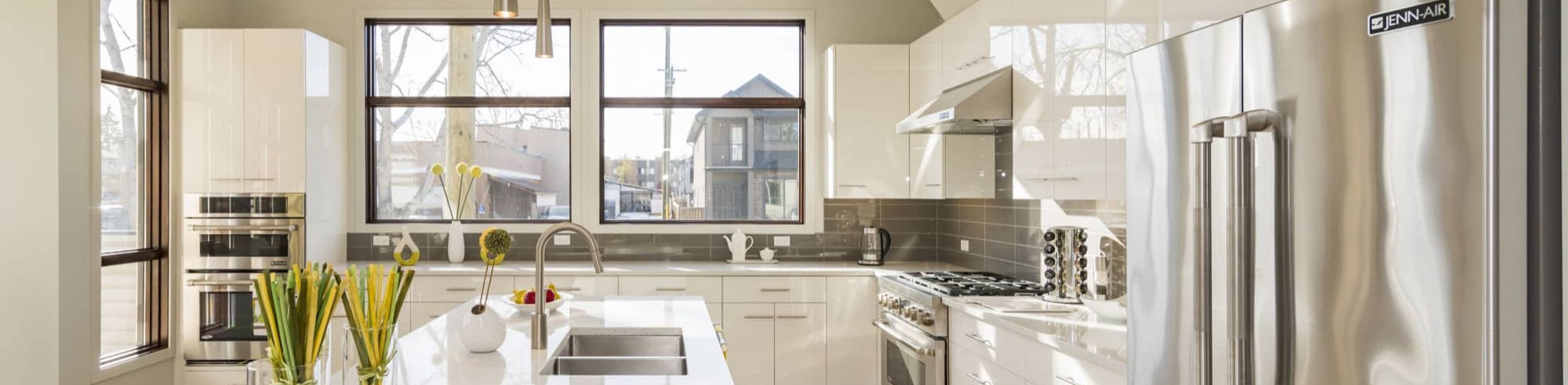 modern kitchen renovation with shaker cabinets and quartz countertops